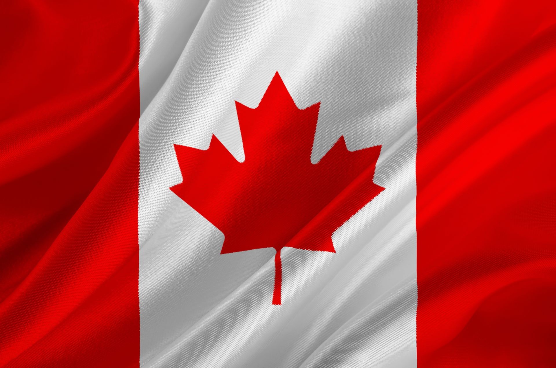 Flag of Canada with maple leaf on crumpled textile, Cannabis in Canada